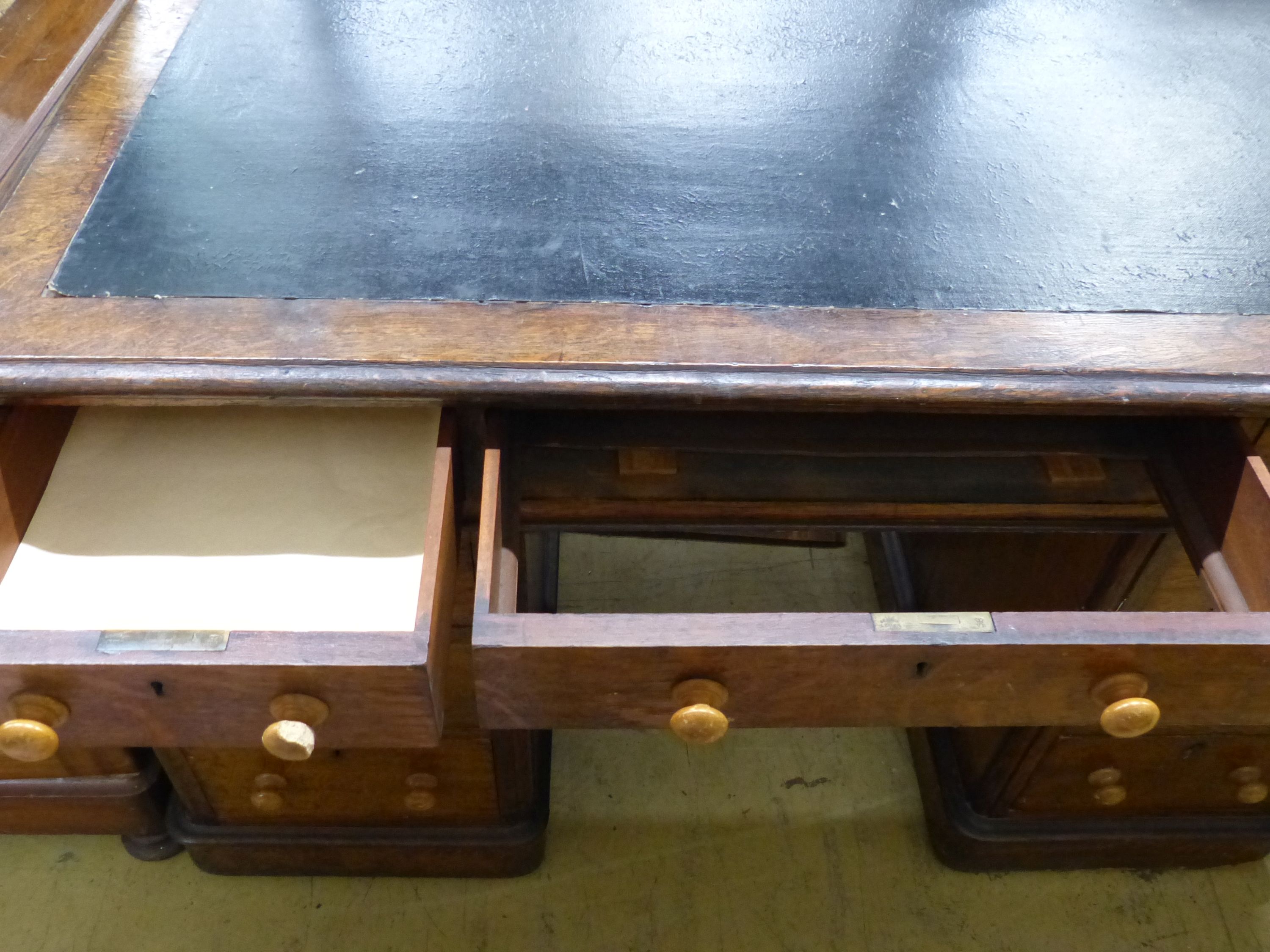 A late Victorian oak pedestal desk, length 122cm